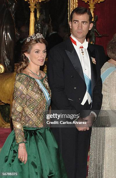 Crown Prince Felipe and Princess Letizia of Spain attend an official dinner in honour of Russian President Vladimir Putin at the Royal Palace, on...