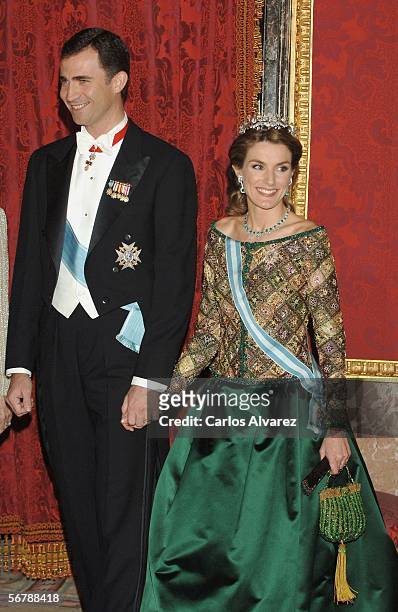 Crown Prince Felipe and Princess Letizia of Spain attend an official dinner in honour of Russian President Vladimir Putin at the Royal Palace, on...