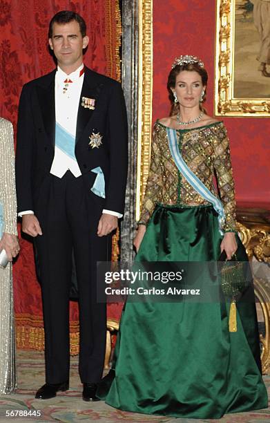 Crown Prince Felipe and Princess Letizia of Spain attend an official dinner in honour of Russian President Vladimir Putin at the Royal Palace, on...