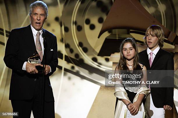 Los Angeles, UNITED STATES: Best pop Instrumental Album winner Bert Bacharach stands with his children during the 48th Annual Grammy Awards...