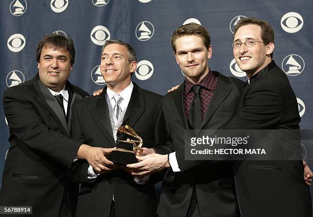 Los Angeles, UNITED STATES: Members of The Turtle Island String Quartet pose with their trophy during the 48th Grammy Awards in Los Angeles, CA 08...