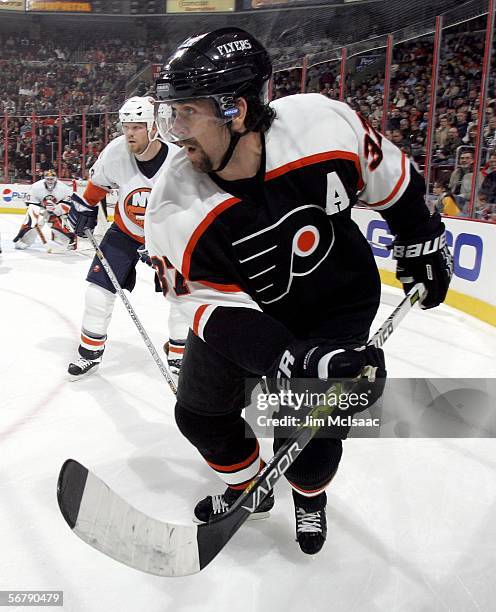 Eric Desjardins of the Philadelphia Flyers skates against of the New York Islanders on February 8, 2006 at the Wachovia Center in Philadelphia,...