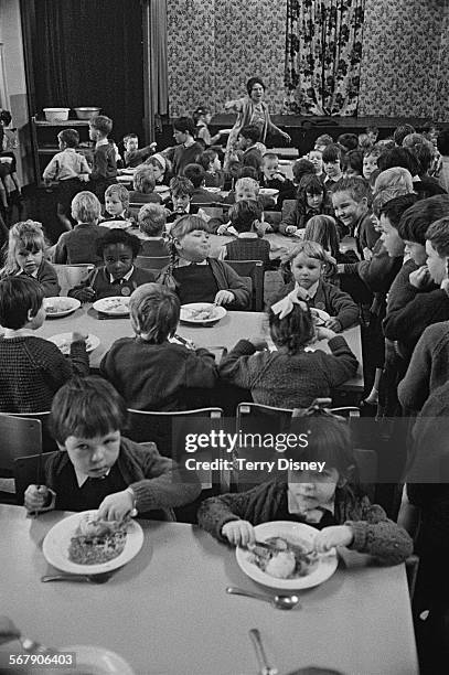 Mrs. Kathryn Ashenden supervising lunchtime for pupils of St John's C Of E Primary School during a teacher strike, Kilburn, London, 13th September...