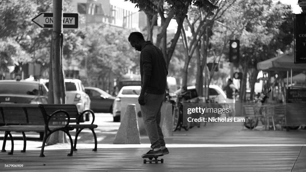 Lone Skateboarder on Street