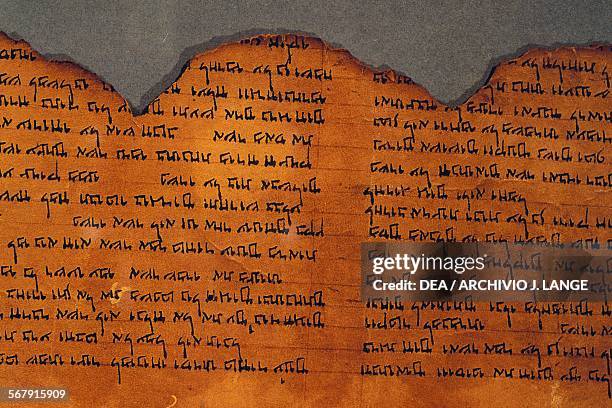 One of the Dead Sea scrolls, detail, Shrine of the Book, Jerusalem, Israel. Jerusalem, Israel Museum