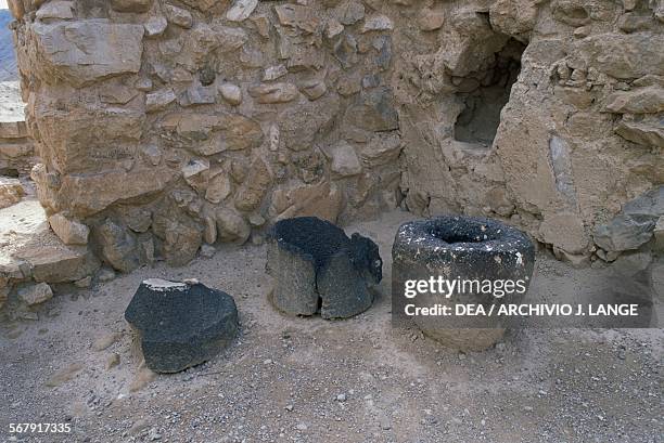 Millstones, ancient Essene settlement of Khirbet Qumran, Israel.