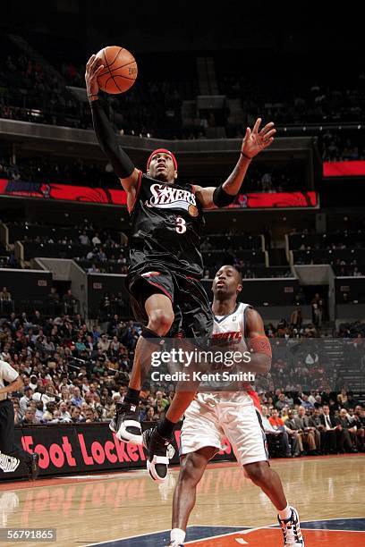 Allen Iverson of the Philadelphia 76ers shoots against the Charlotte Bobcats on February 8, 2006 at the Charlotte Bobcats Arena in Charlotte, North...