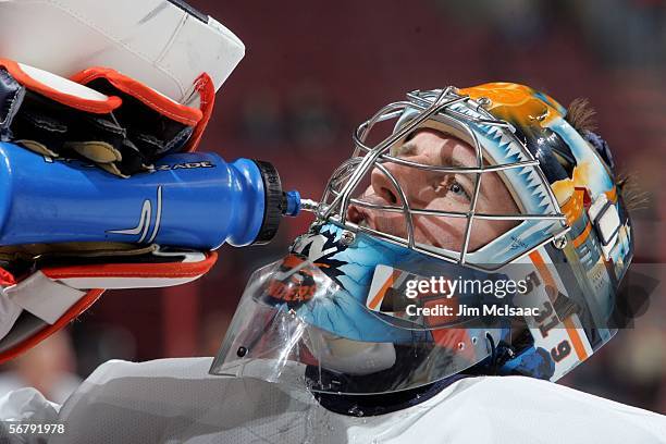 Garth Snow of the New York Islanders takes a drink of water before playing the Philadelphia Flyers on February 8, 2006 at the Wachovia Center in...