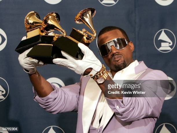 Singer Kanye West poses with his Best Rap Song, Best Rap Solo Performance and Best Rap Album awards in the press room at the 48th Annual Grammy...