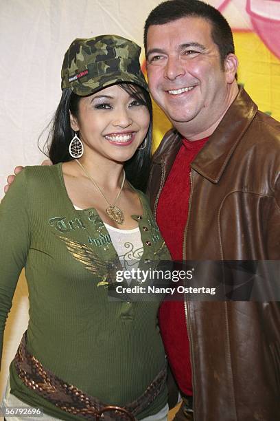 Hosts of "L.A. Nightlife," Mika Tan and James Bartholet arrive at the celebrity book signing party for Donna Spangler and her new book, "How to Get a...