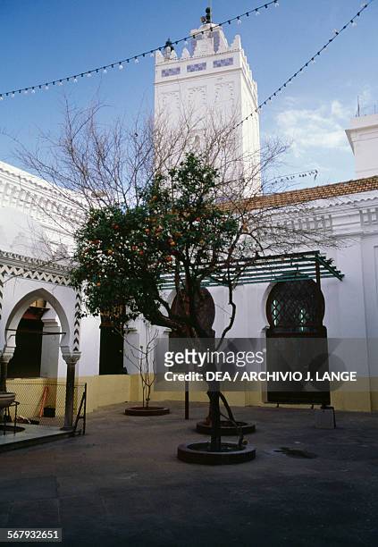Courtyard and minaret of the Great Mosque or El Kebir Mosque, Algiers. Algeria, 11th century.