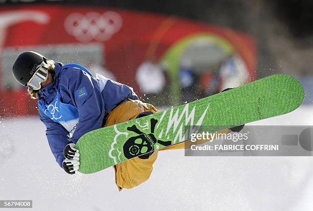Sweden's Halfpipe snowboarder Mikael Sandy practices on the eve of the start of the Turin 2006 Winter Olympic Games 09 February 2006 in Bardonecchia,...