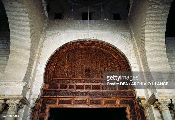 Upper part of the main door of the prayer hall in the Mosque of 'Uqba or Great Mosque of Kairouan , Kairouan Governorate. Tunisia, 9th century.