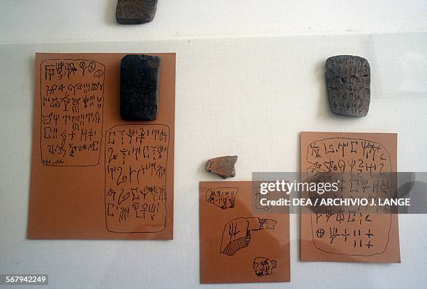 Linear A Script Examples Tablets With Linear A Inscriptions Photos and Premium High Res Pictures ...