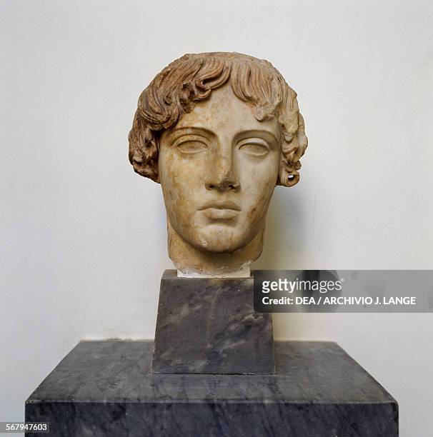 Head of Apollo Omphalos, marble sculpture, Roman copy of Calamis' original from Baia, Campania, Italy, ca 460 BC. Roman civilisation, 2nd century AD....