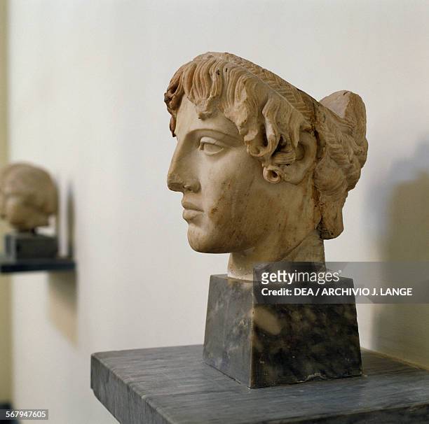 Head of Apollo Omphalos, marble sculpture, Roman copy of Calamis' original from Baia, Campania, Italy, ca 460 BC. Roman civilisation, 2nd century AD....