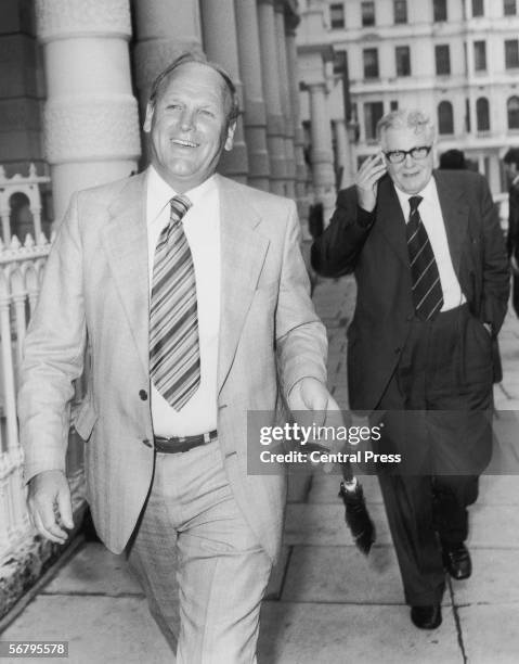 West Ham manager Ron Greenwood leaves the Football Association offices in London for lunch with Sir Harold Thompson, the organization's chairman,...
