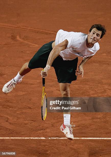 Hitting partner Marc Kimmich of Australia serves during an Australian practice session prior to the Davis Cup first round match between Switzerland...