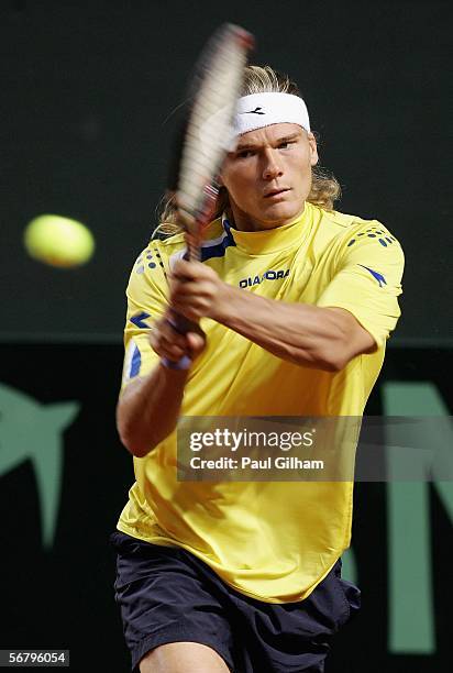 Peter Luczak of Australia plays a backhand during an Australian practice session prior to the Davis Cup first round match between Switzerland and...