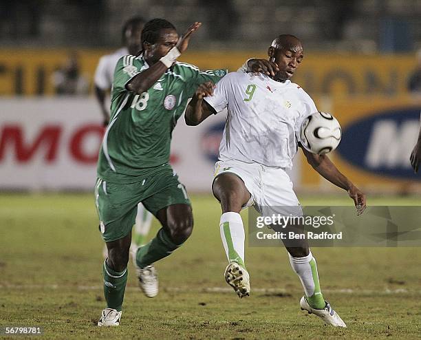 Christian Ododo of Nigeria and Souleymane Camara of Senegal in action during The African Cup of Nations, Third Place Playoff match between Senegal v...