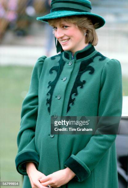 Princess Diana visiting Bristol during her pregnancy with her first son, Prince William. Diana is wearing a coat designed by Bellville Sassoon and a...