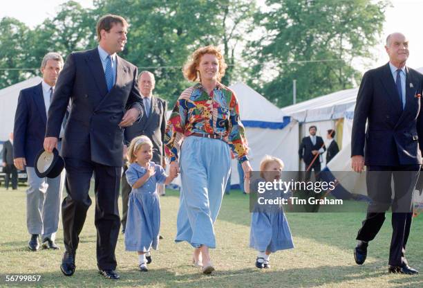 The Duke and Duchess of York with their daughters, Beatrice and Eugenie at the Windsor Horse Show. Accompanying them is Ronald Ferguson, Sarah's...
