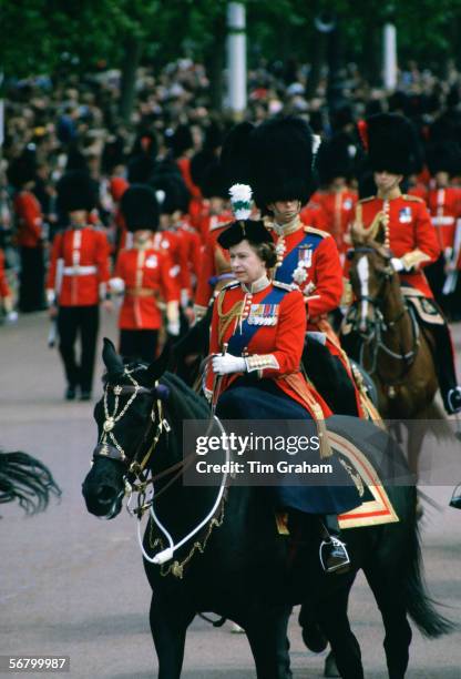 Queen Elizabeth II riding sidesaddle takes part in the Trooping the Colour procession.