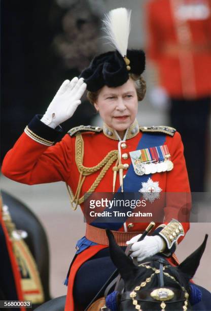 Queen Elizabeth II taking part in Trooping the Colour parade.