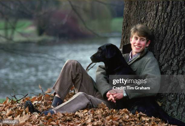 Prince Edward with his labrador dog 'Frances' in the grounds of Buckingham Palace. The picture was taken to mark his 18th birthday.
