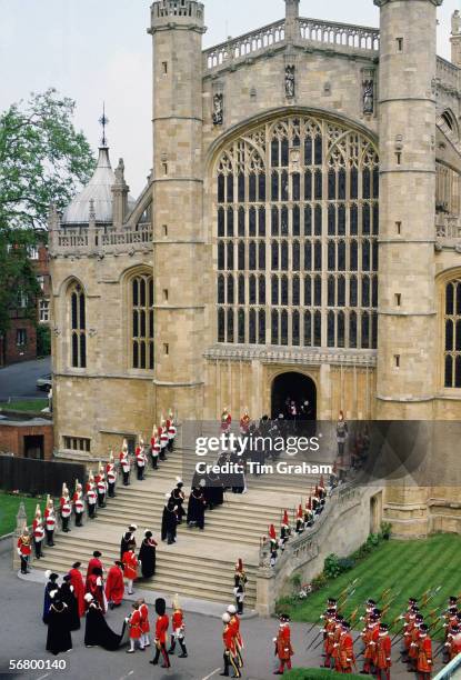 Yeomen of the Guard accompany the Royal Family attending The Order of the Garter at St George's Chapel, Windsor Castle.