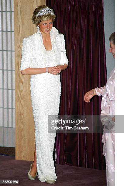 Princess Diana, Princess of Wales wearing the 'Elvis dress' during a visit to the Culture Centre in Hong Kong.