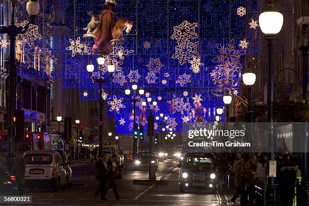 Christmas decorations and traffic in Regent Street, London, United Kingdom.