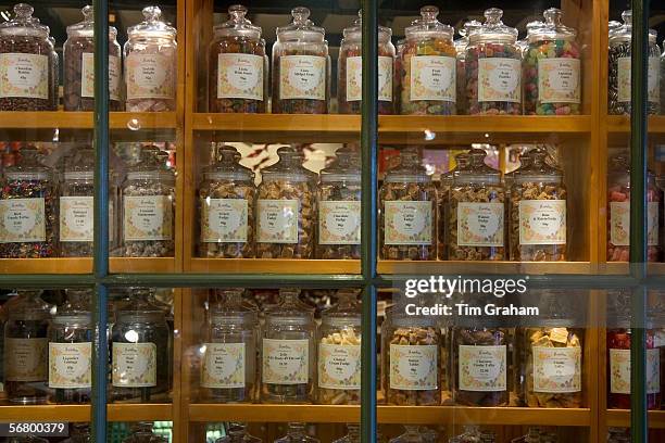 Old fashioned sweet shop with candy in glass jars in Burford, Oxfordshire, United Kingdom.