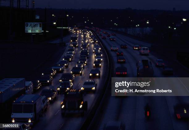 1950s: Busy highway at night.