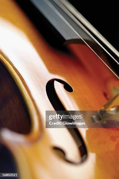 extreme close-up of violin - violin family stock pictures, royalty-free photos & images