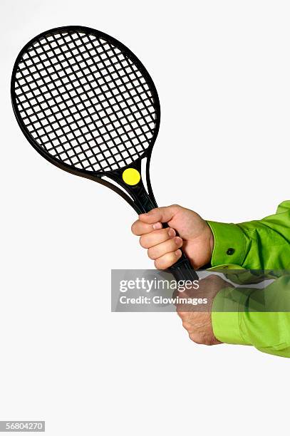 Hand Tennis Racket 778 Hand Holding Tennis Racket Stock Photos, High-Res Pictures, and ...