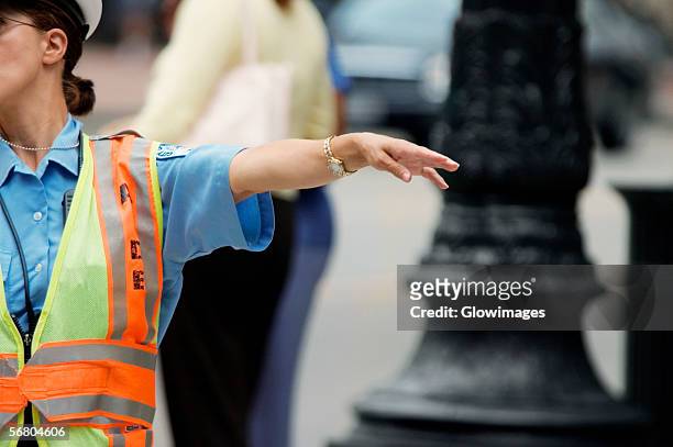 close-up of a crossing guard directing traffic, chicago, illinois, usa - 交通誘導員 ストックフォトと画像