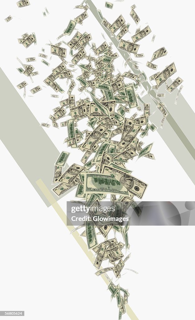 American dollar bills falling from the sky