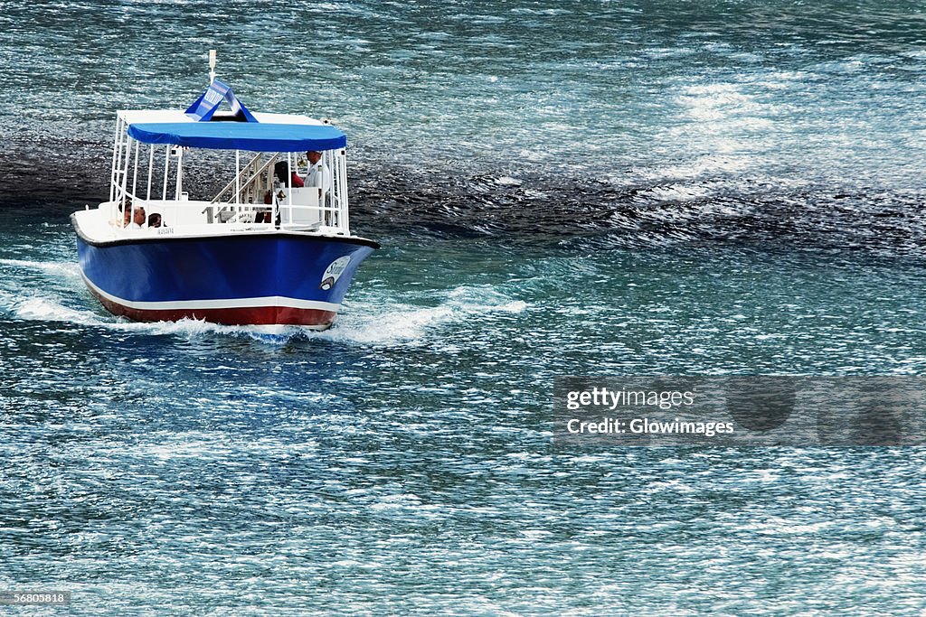 High angle view of a water taxi moving on a river, Chicago River, Chicago, Illinois, USA