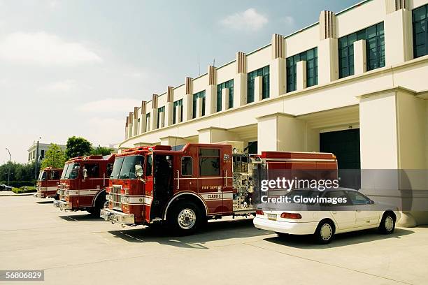 side profile of fire engines at a fire department, beverly hills fire department, los angeles, california, usa - fire engine ストックフォトと画像