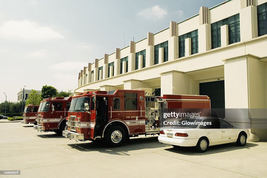 Side profile of fire engines at a fire department, Beverly Hills Fire Department, Los Angeles, California, USA