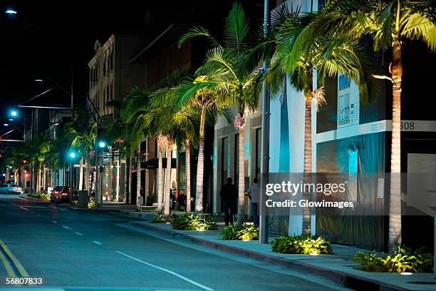 street at night, rodeo drive, los angeles, california, usa - beverly hills rodeo drive stock pictures, royalty-free photos & images