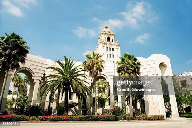 low angle view of a building, beverly hills city hall, los angeles, california, usa - beverly hills ca stock pictures, royalty-free photos & images