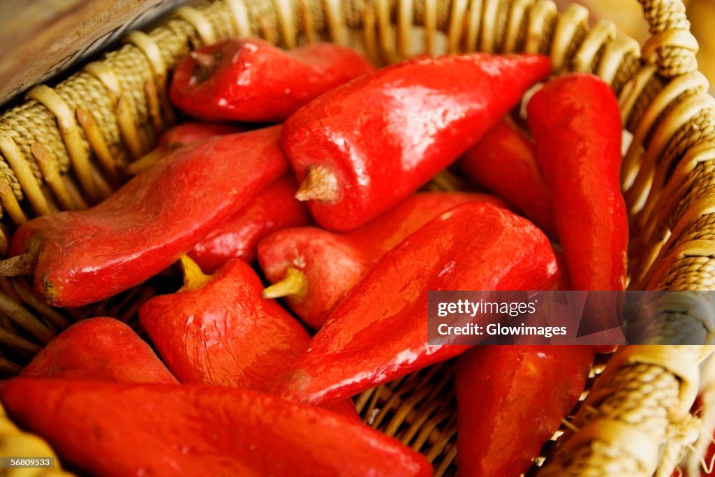 Close-up of artificial chilies in a basket, San Diego, California, USA