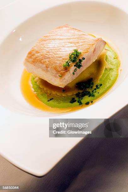 close-up of a dish of filleted fish - filleted stock pictures, royalty-free photos & images