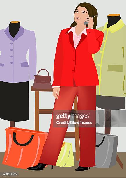 woman talking on a mobile phone in a clothing store - offener kragen stock-grafiken, -clipart, -cartoons und -symbole