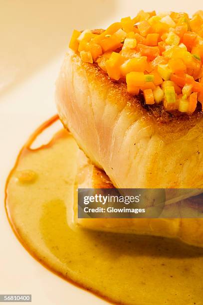 close-up of a dish of filleted fish - filleted stock pictures, royalty-free photos & images