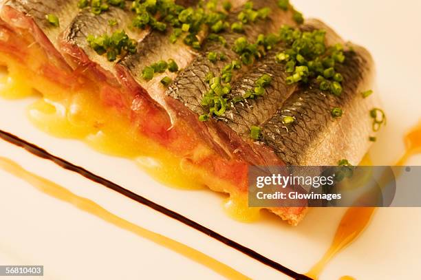 close-up of a tray of filleted fish - filleted stock pictures, royalty-free photos & images