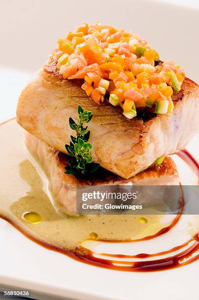 close-up of a dish of filleted fish - filleted stock pictures, royalty-free photos & images