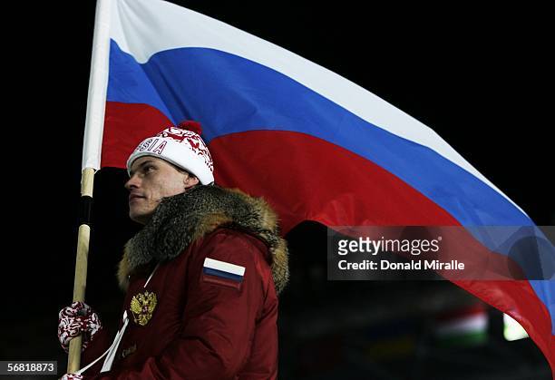 The Russian flag bearer attends the Opening Ceremony of the Turin 2006 Winter Olympic Games on February 10, 2006 at the Olympic Stadium in Turin,...
